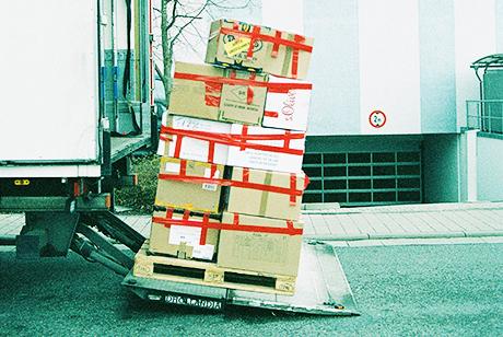 A close-up of packages being loaded or sorted