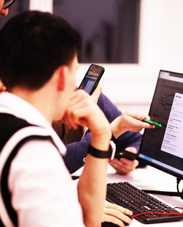 A staff member using a logistics dashboard or tablet